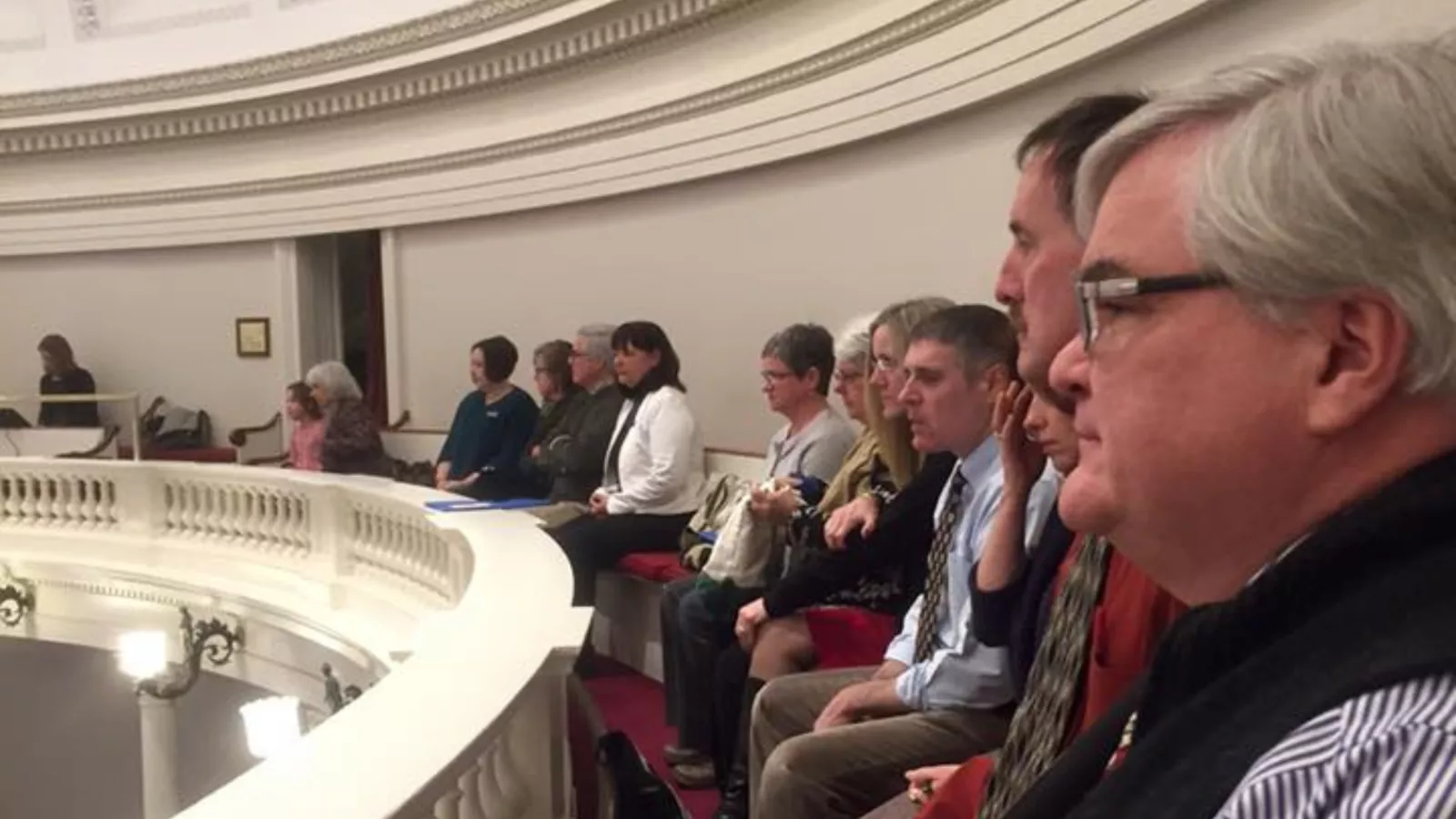 VT-NEA President Don Tinney sits in the statehouse gallery with fellow educators