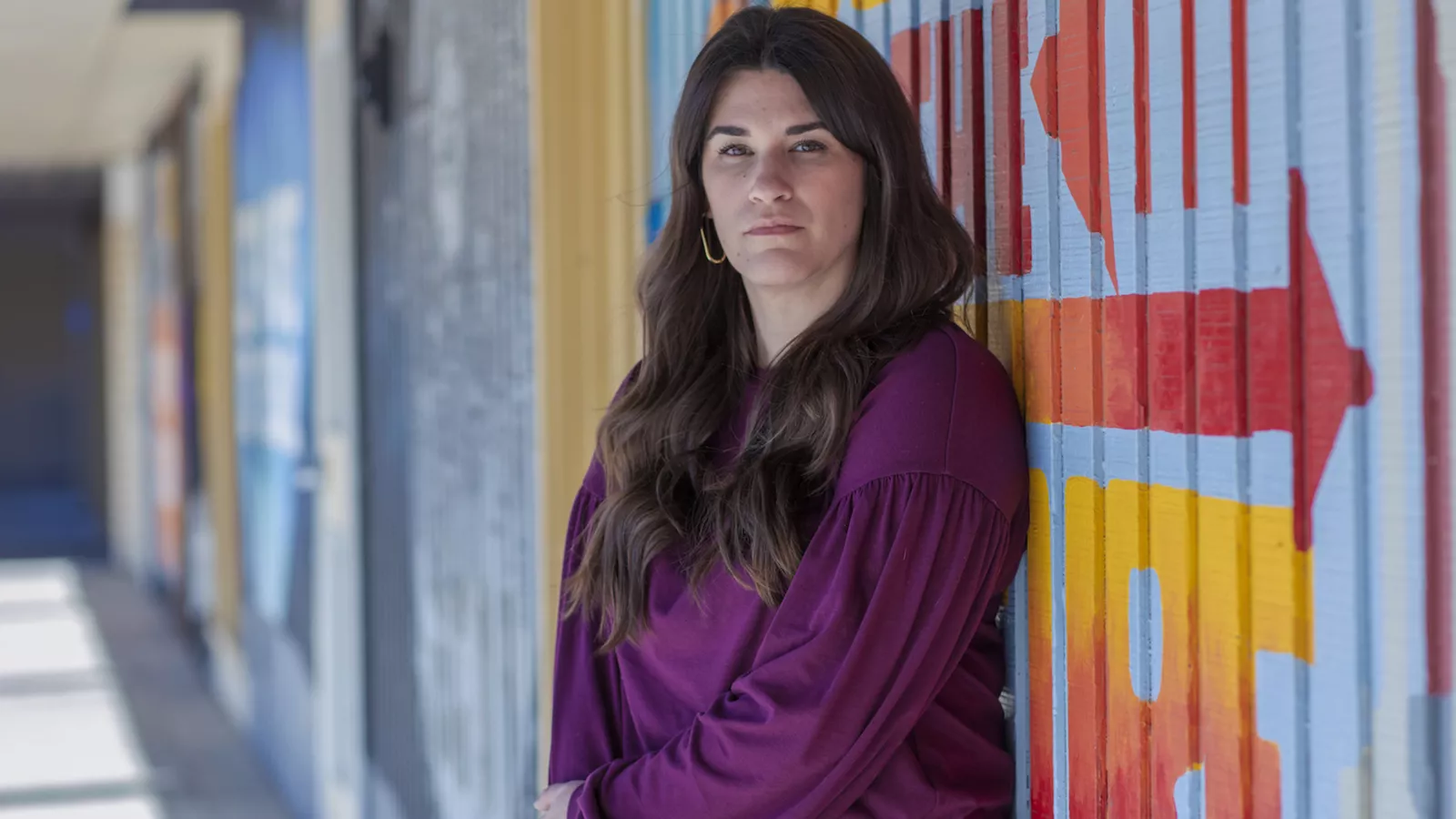 Educator Erin Castillo outside her school building
