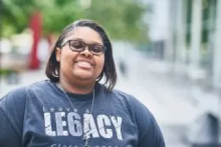 A VT-NEA member smiles for a picture.