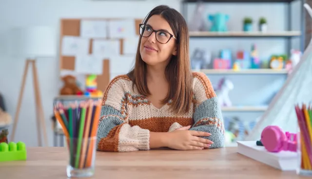 teacher at desk