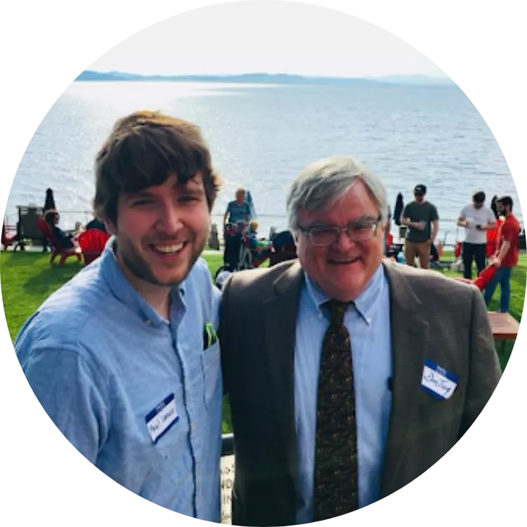 Don Tinney poses in front of lake